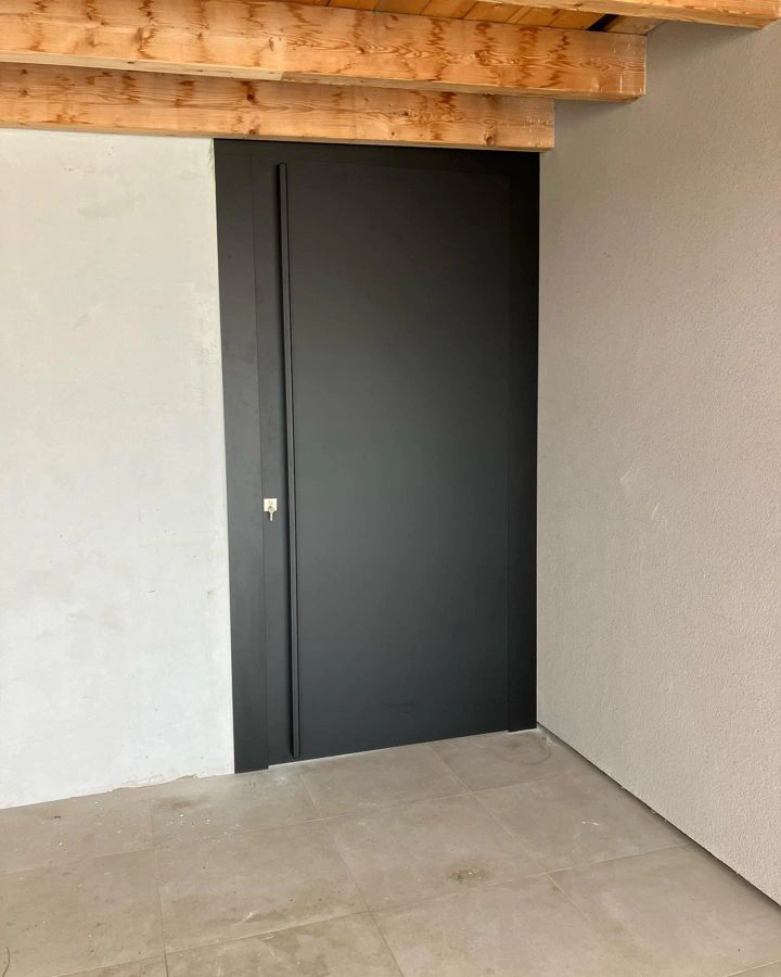 Jet black RAL 9005 black minimalist entrance door