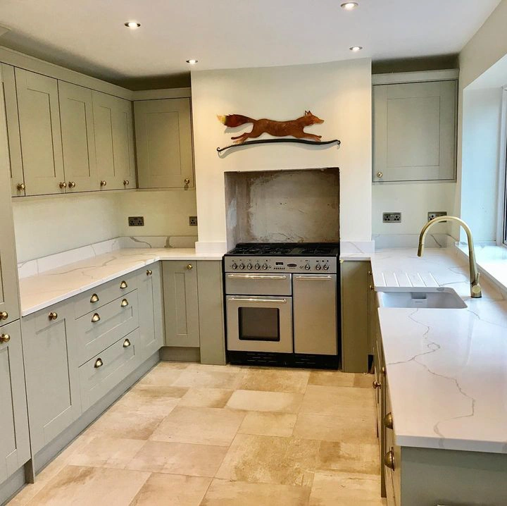 Sage kitchen cabinets with James White color by Farrow and Ball