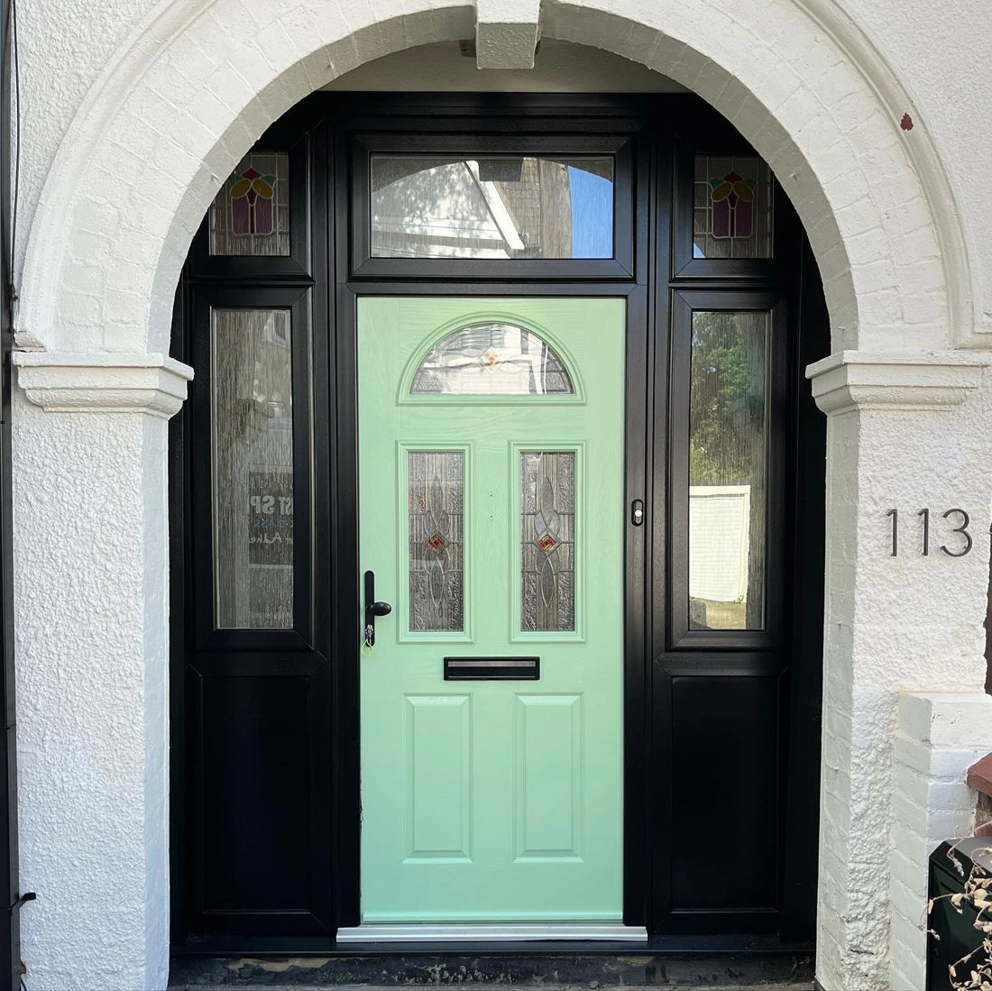 Pastel green RAL 6019 painted entrance door