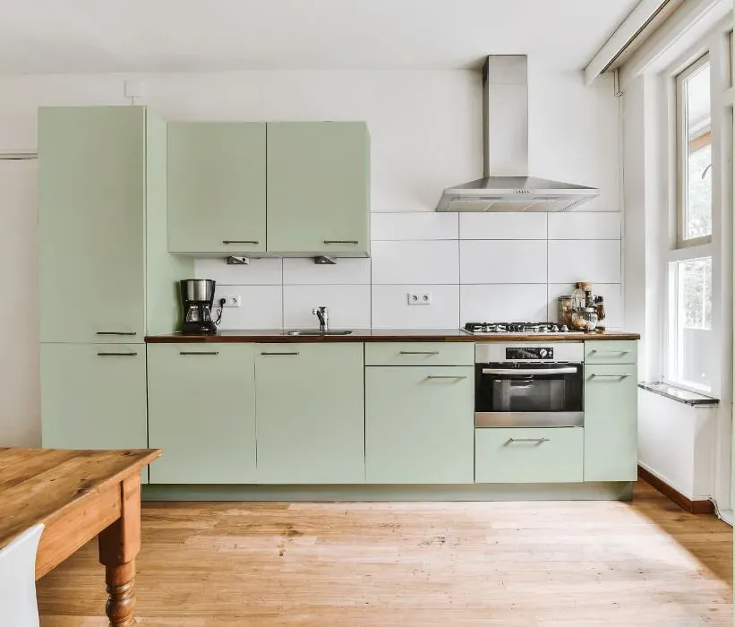 Behr Comforting Green kitchen cabinets