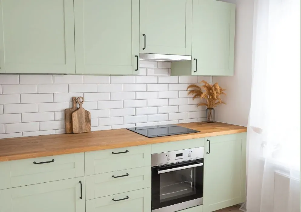 Behr Comforting Green kitchen cabinets