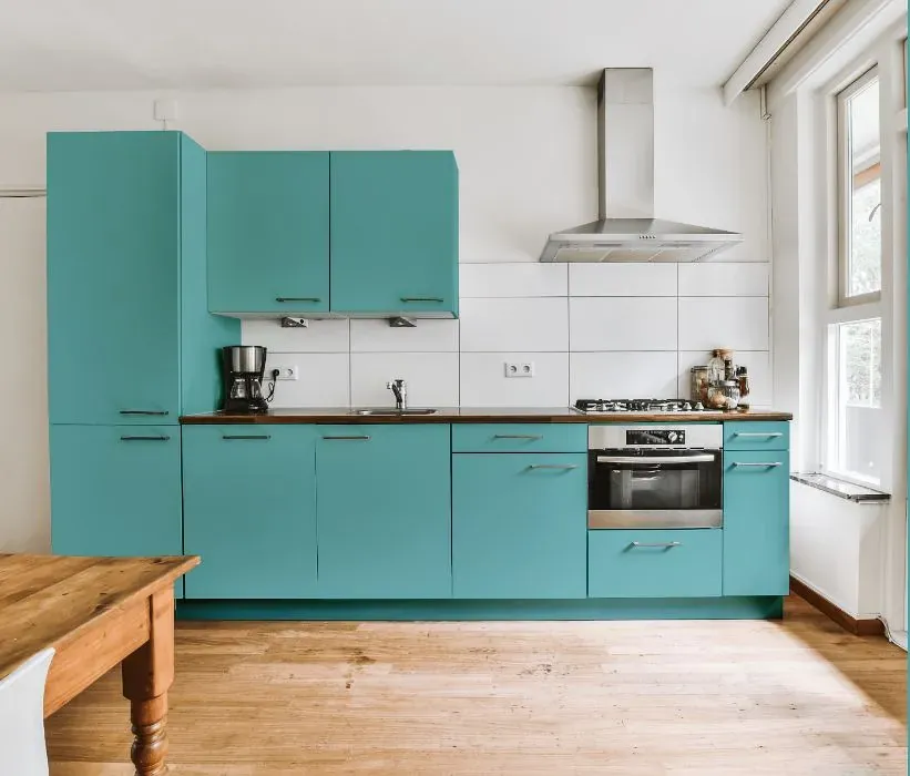 Behr Pure Turquoise kitchen cabinets