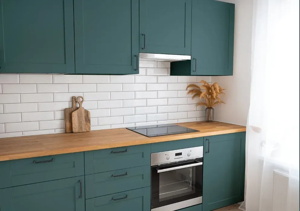 Behr Sophisticated Teal kitchen cabinets
