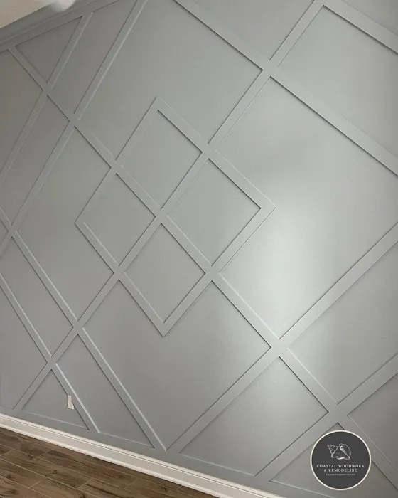 Benjamin Moore Feather Gray accent wall panelling 