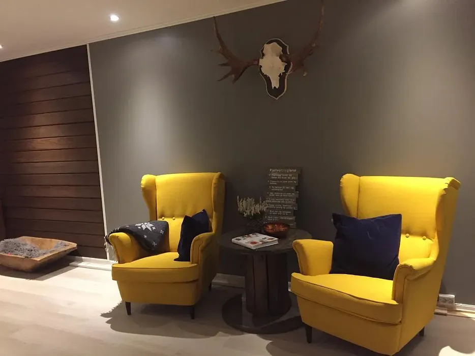 Jotun Discrete living room with yellow armchairs