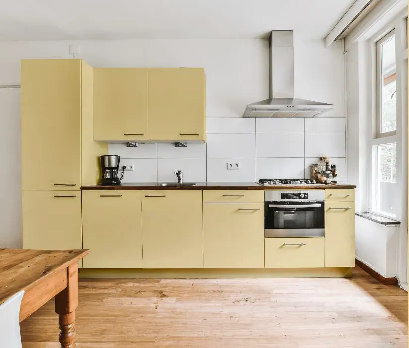 Sherwin Williams Glad Yellow kitchen cabinets