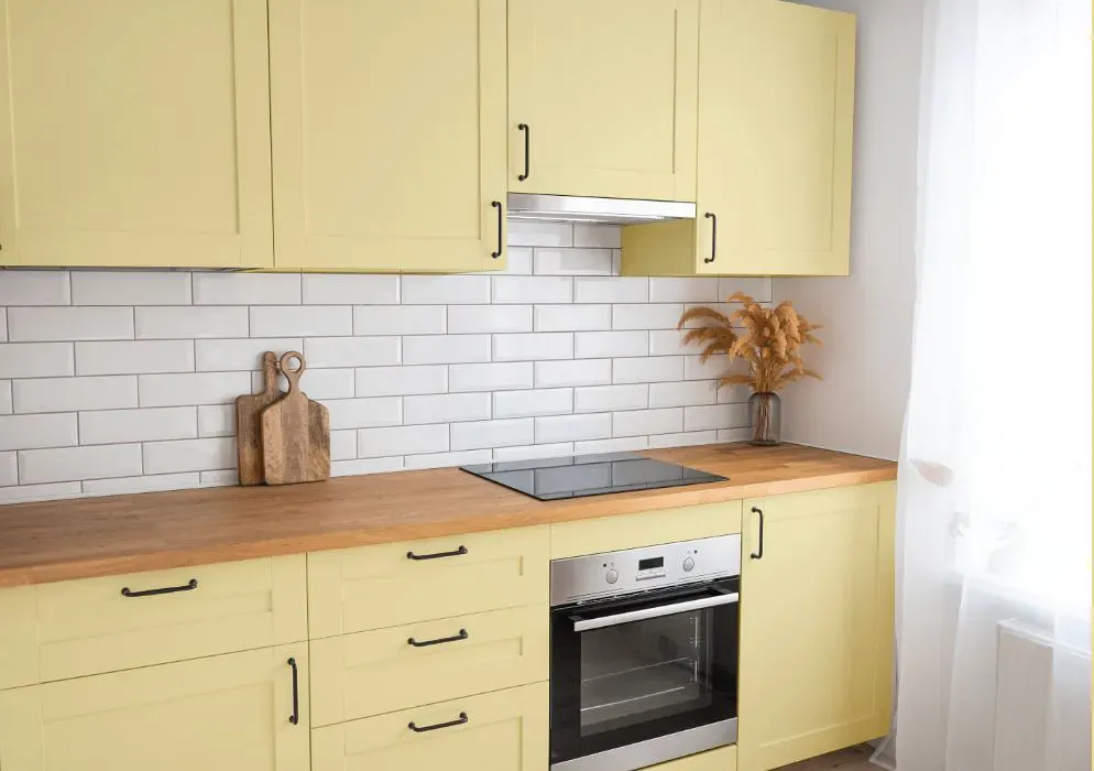 Sherwin Williams Glisten Yellow kitchen cabinets