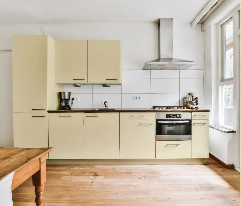 Sherwin Williams Glittery Yellow kitchen cabinets