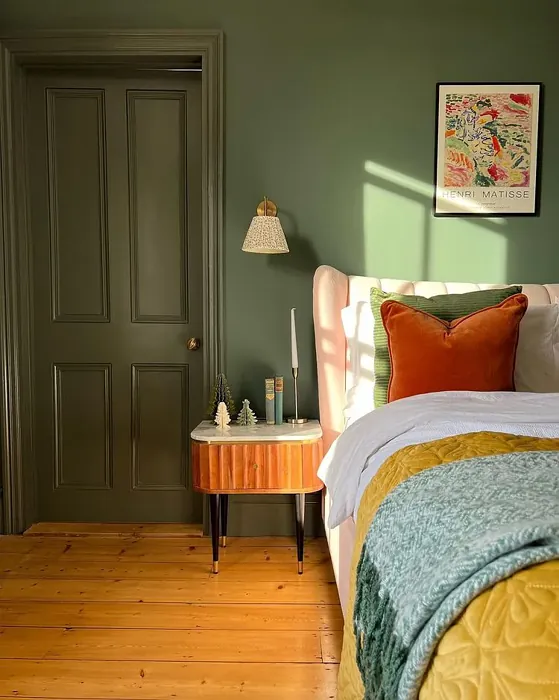 Edwardian house bedroom interior with warm Green Smoke color