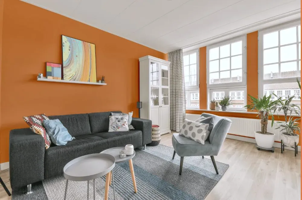 Sherwin Williams Inventive Orange living room walls