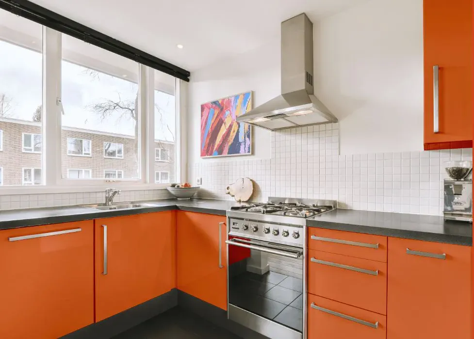 Sherwin Williams Knockout Orange kitchen cabinets