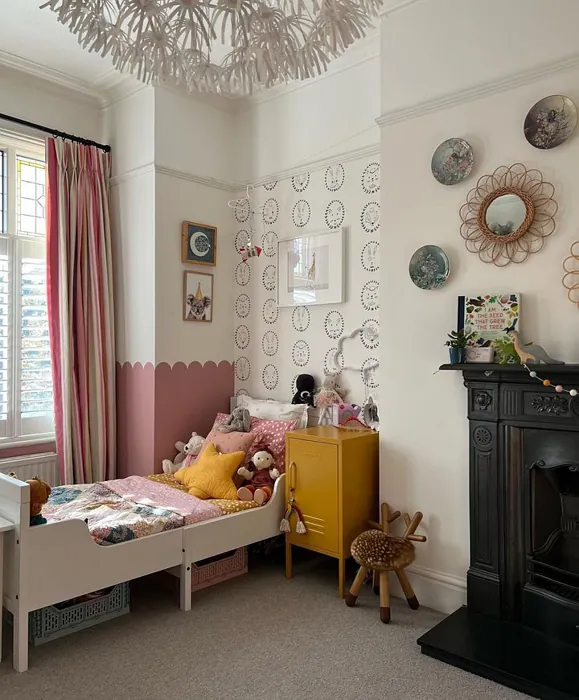 Scalloped wall in a kids room with pink Little Greene Hellbore