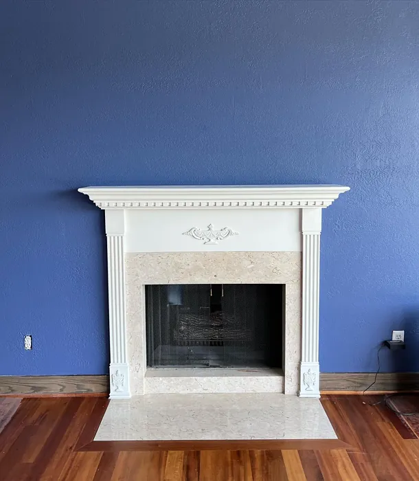 Sherwin Williams Luxe Blue living room fireplace 