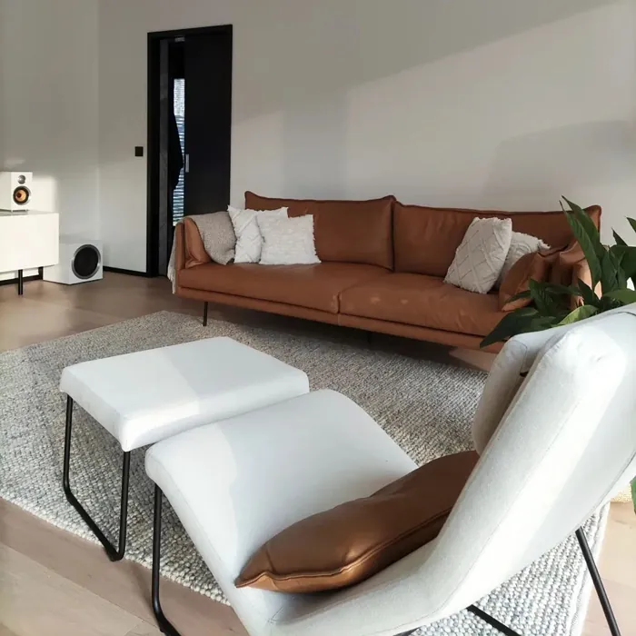 Tikkurila Paper F497 living room with lether orange sofa