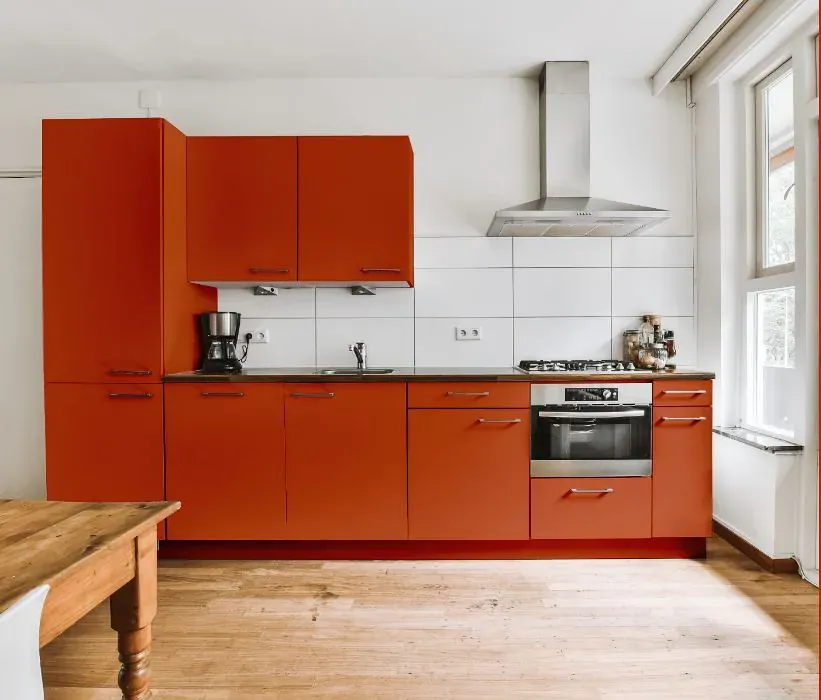 Sherwin Williams Raucous Orange kitchen cabinets