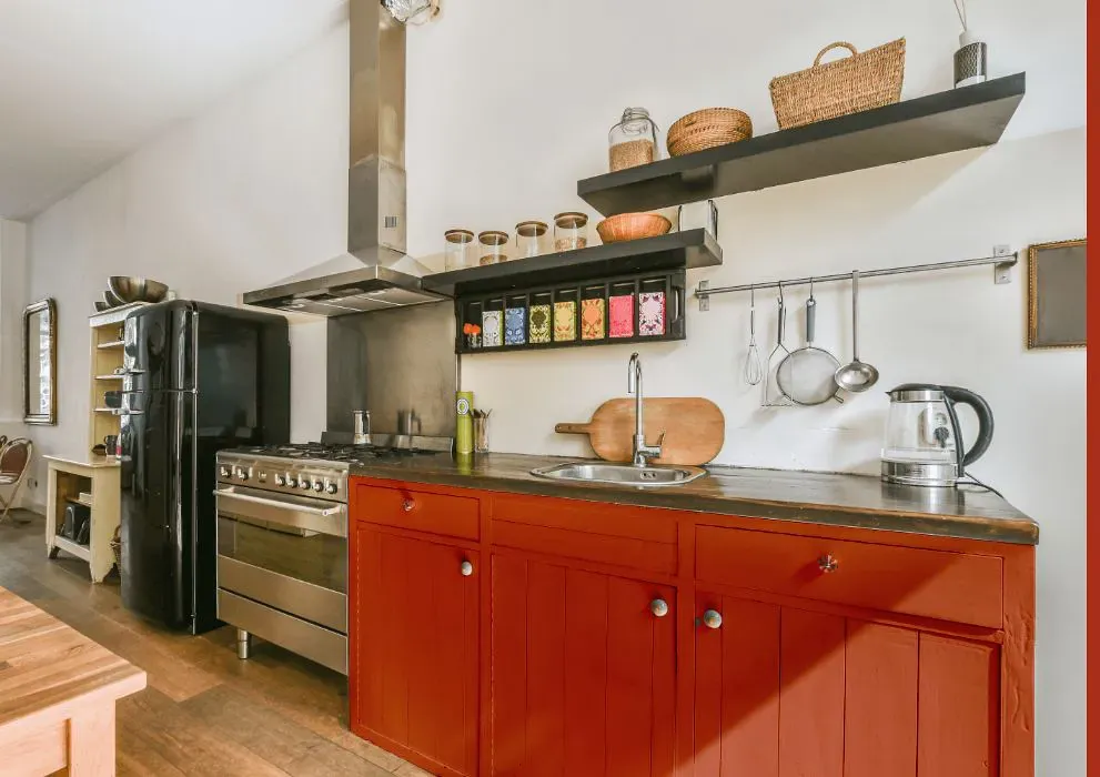 Sherwin Williams Raucous Orange kitchen cabinets