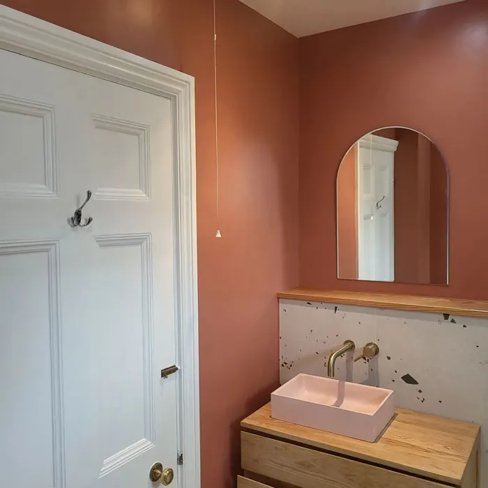 Red Earth red bathroom with terrazzo