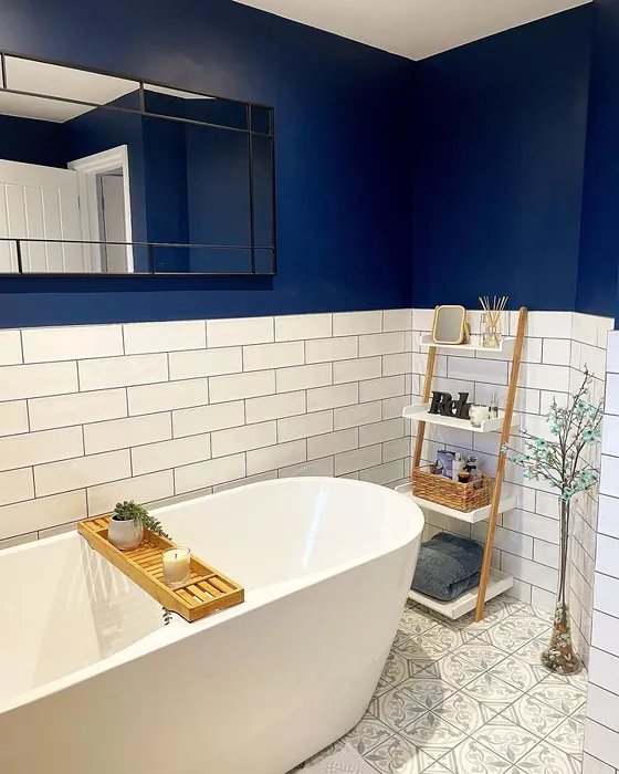 Blue bathroom walls with white metro tiles Dulux Sapphire salute