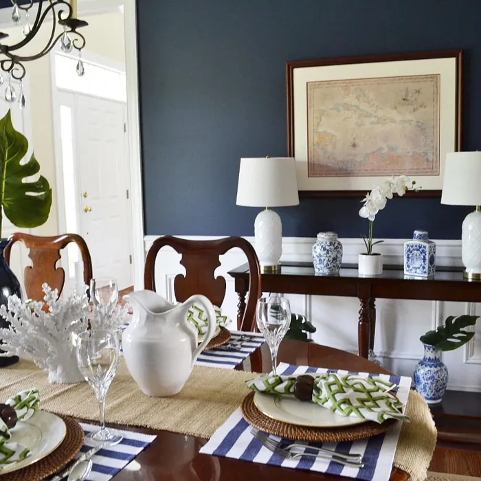 Dark blue dining room interior Sherwin Williams Naval color