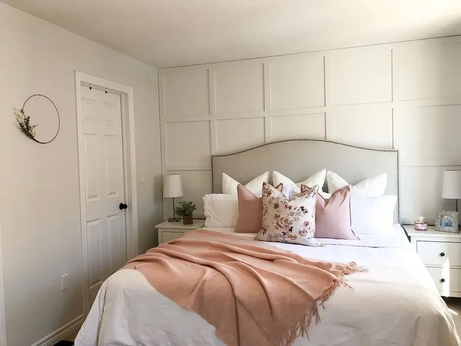 Paneled white wall in a bedroom with Silver Satin paint review
