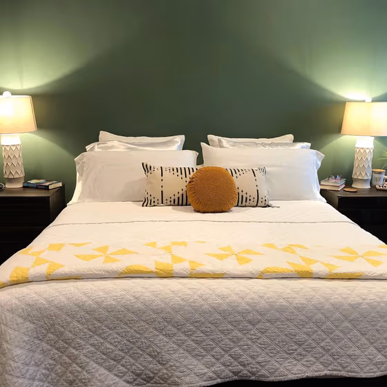 Green bedroom interior Sherwin Williams Basil color