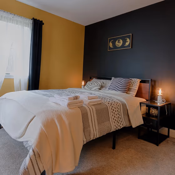 Sherwin Williams Black Magic bedroom accent wall