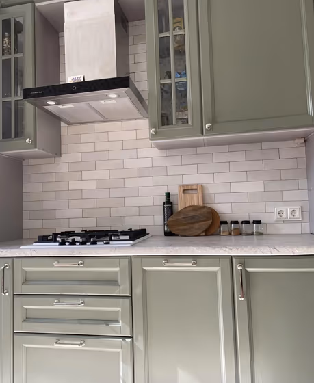 RAL Classic Cement grey RAL 7033 applied to kitchen cabinet