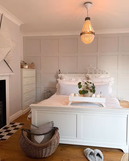Panelling in a bedroom with color Dimpse Farrow and Ball