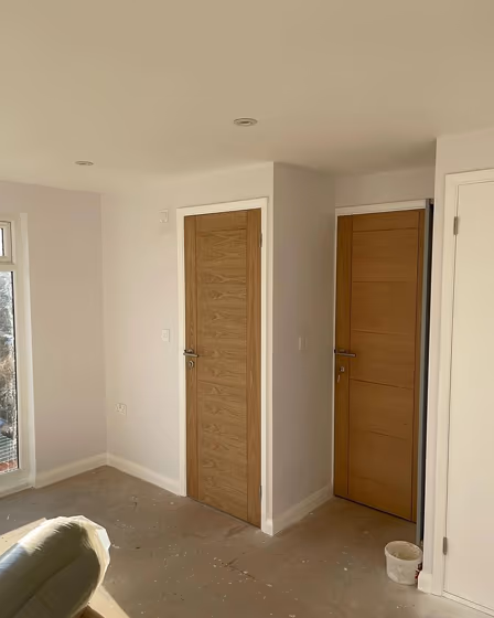 White walls Dulux Rock Salt with wooden doors