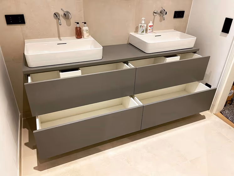 Dusty grey RAL 7037 bathroom cabinets