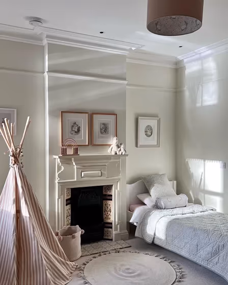 Farrow and Ball James White 2010 kids' room with fireplace