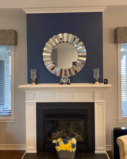 Benjamin Moore Kensington Blue CC-780 living room fireplace