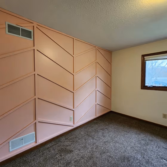 Sherwin Williams Mellow Coral wall panelling