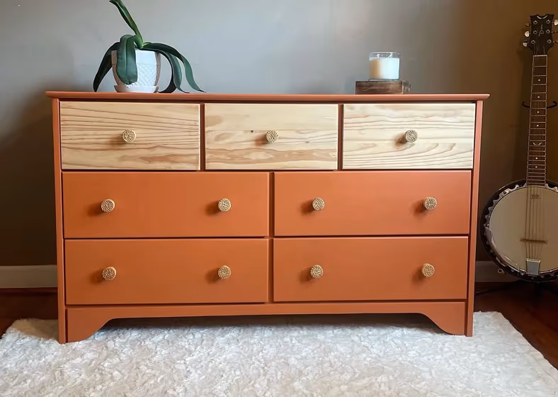 Wooden dresser painted orange Rusty Gate by Behr paint