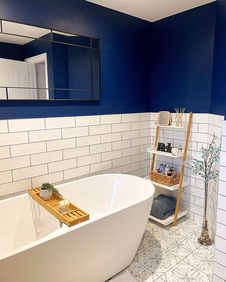 Blue bathroom walls with white metro tiles Dulux Sapphire salute