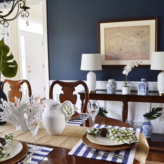 Dark blue dining room interior Sherwin Williams Naval color
