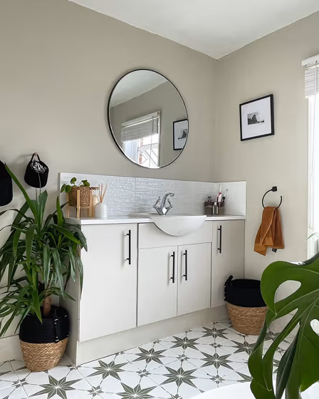 Little Greene Slaked Lime Mid 149 bathroom with big round mirror