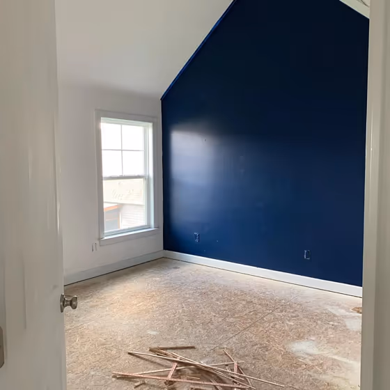 Dark blue accent wall colour Behr Very Navy