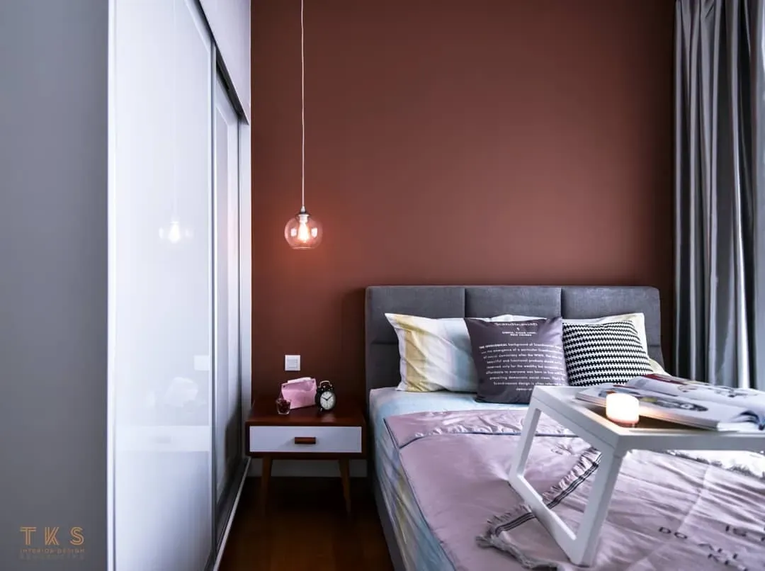 Jotun Amber Red bedroom accent wall