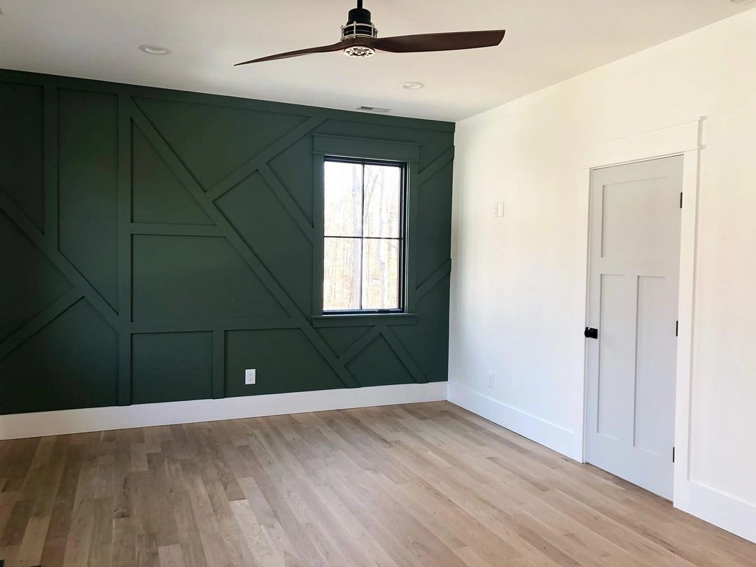 Bedroom wall panelling with green Basil b Sherwin Williams