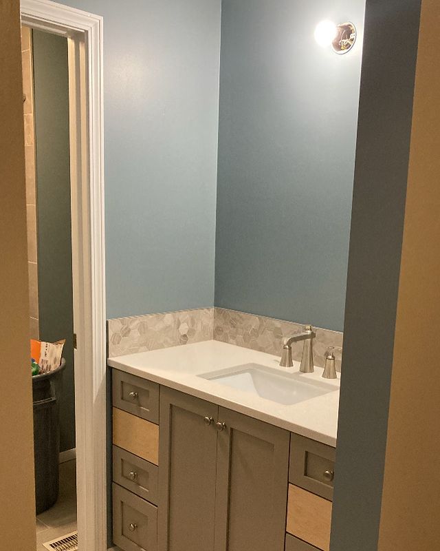 Master bathroom with blue paint color Debonair SW