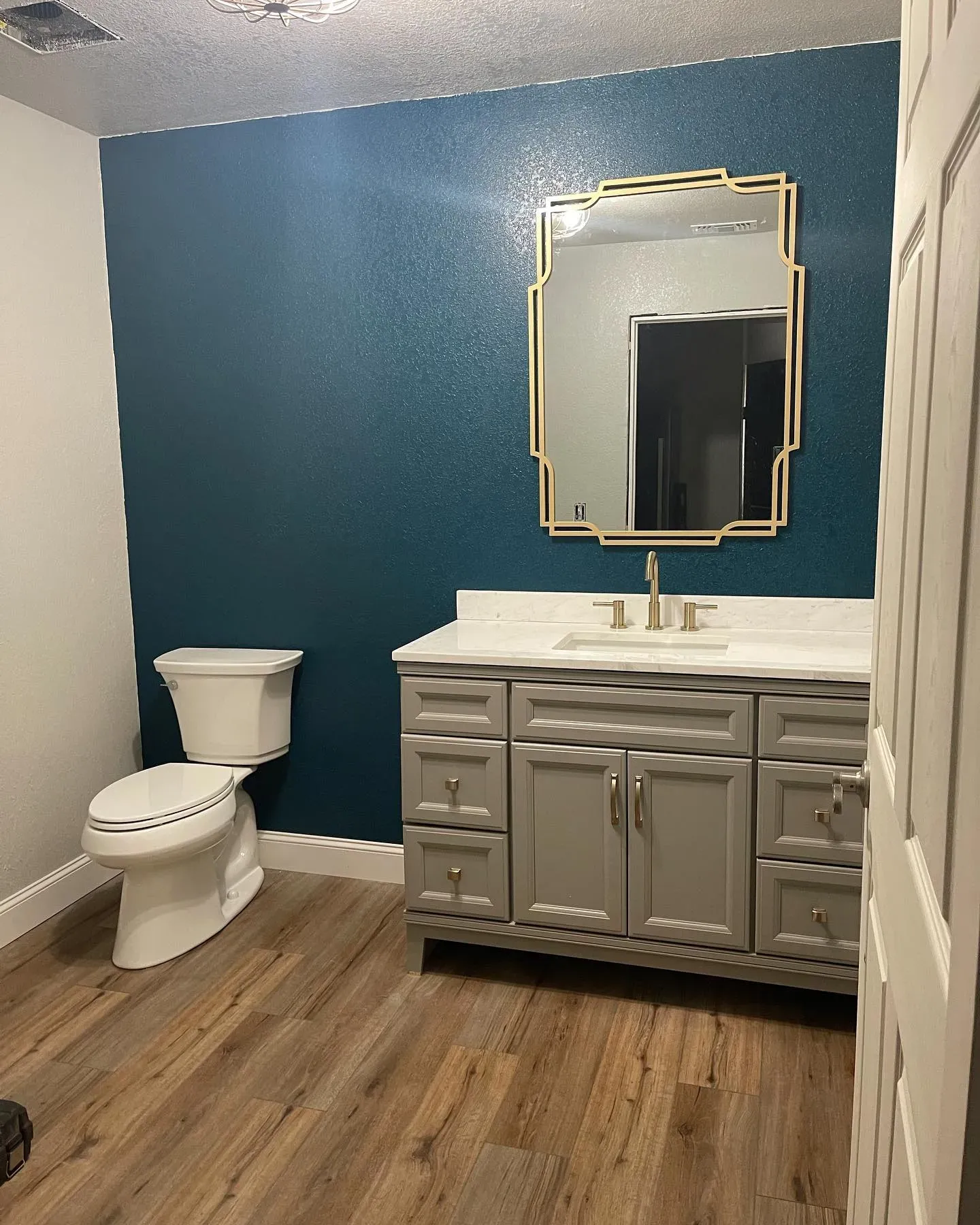 Behr Ocean Abyss bathroom accent wall