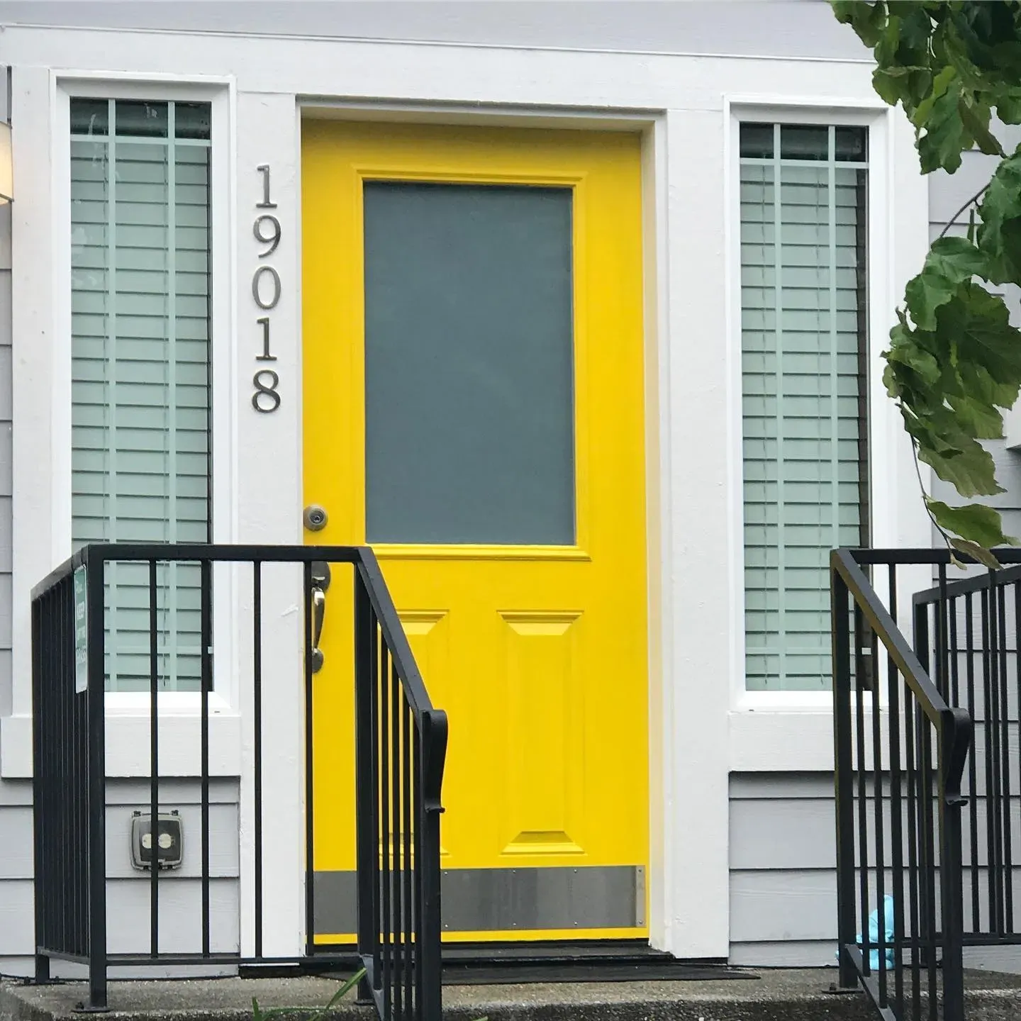 Behr Unmellow Yellow front door paint