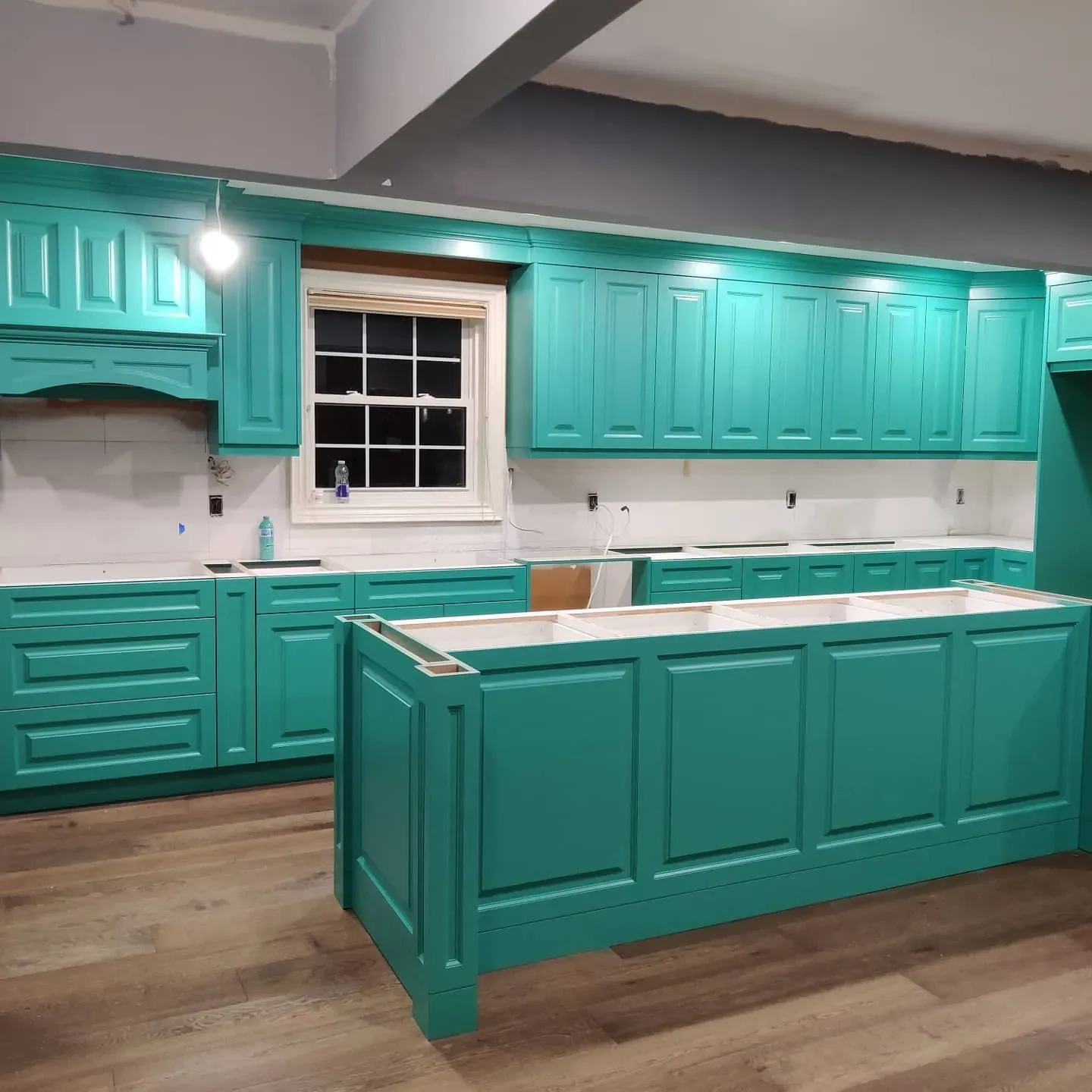 Benjamin Moore Captivating Teal kitchen cabinets 