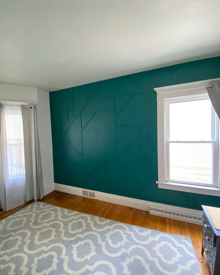 Geometric panelling with teal colour Behr Beta fish