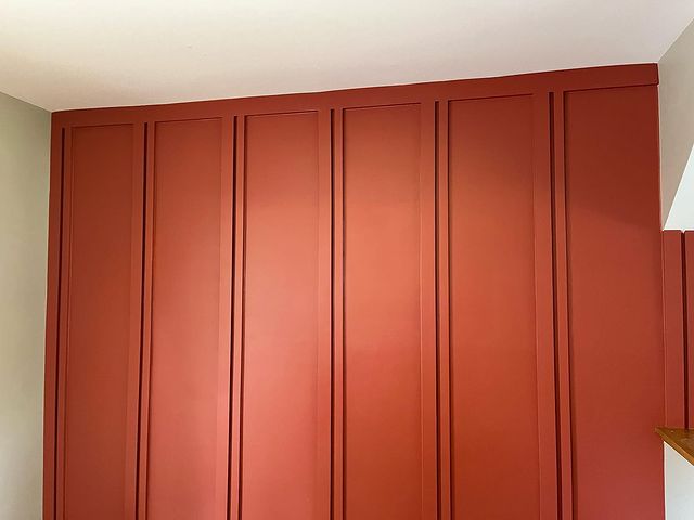 Red panelled wall with paint Sherwin Williams Bravado Red SW6320