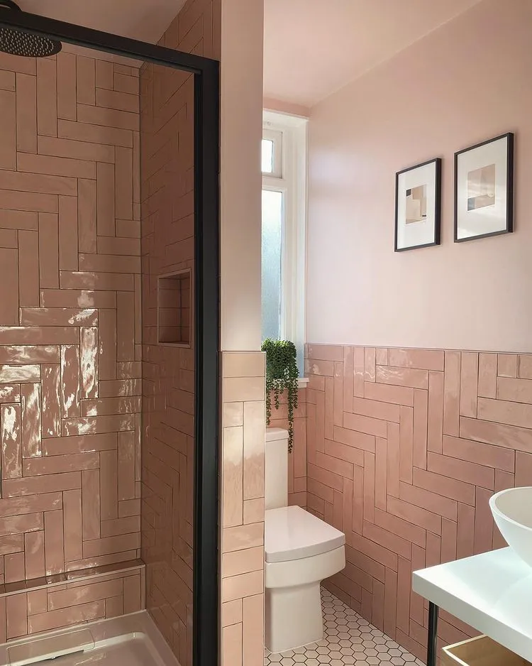 Pink bathroom with black decorating