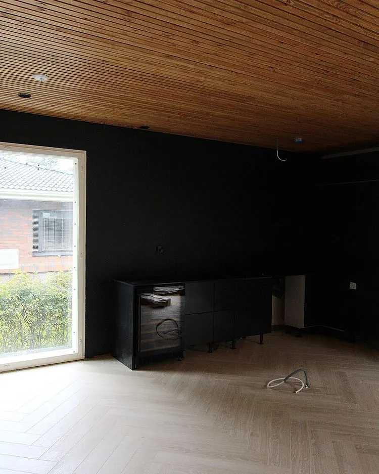 Dark grey Tikkurila X499 walls with wooden ceiling