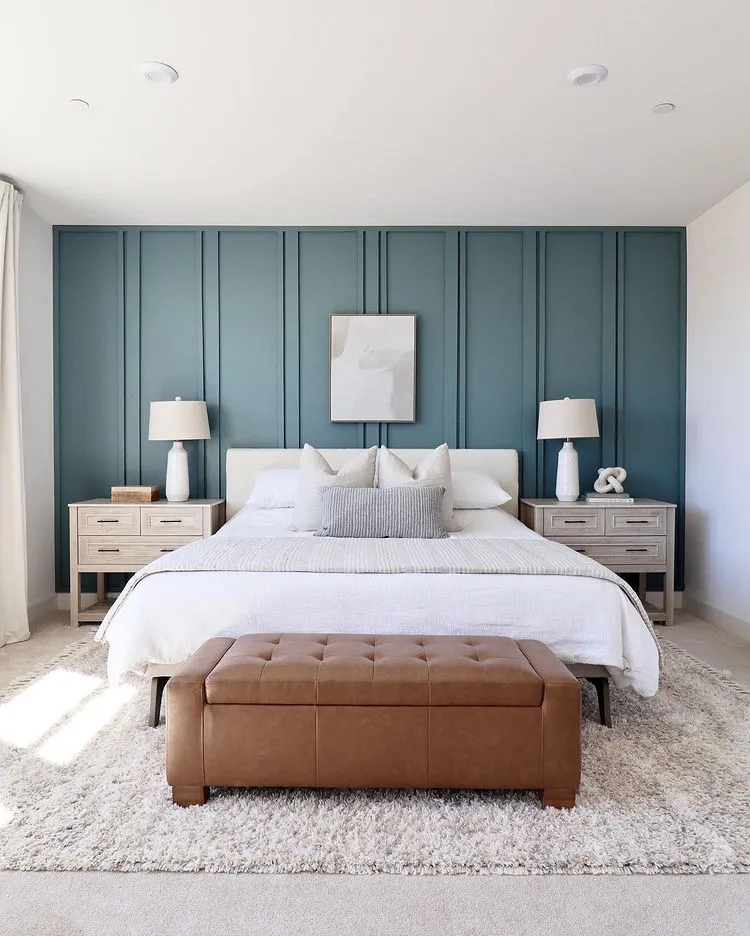 Bedroom with dusted blue accent wall Behr Coney Island