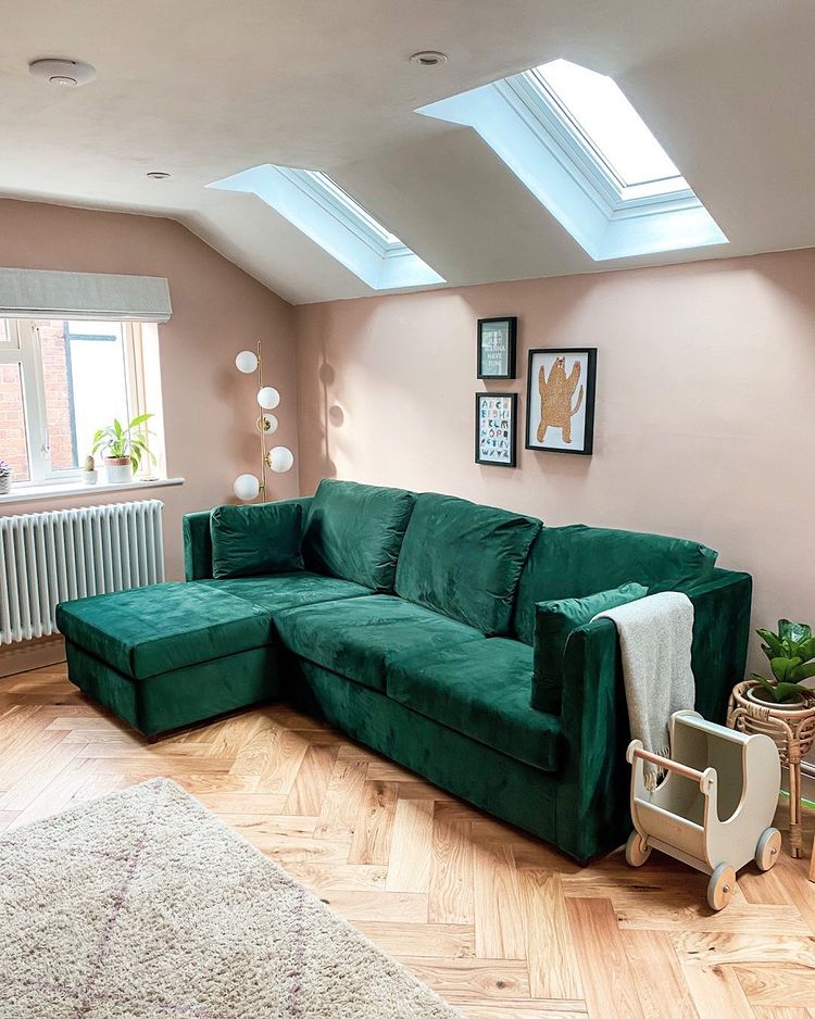 Green couch with pale pink walls Setting Plaster